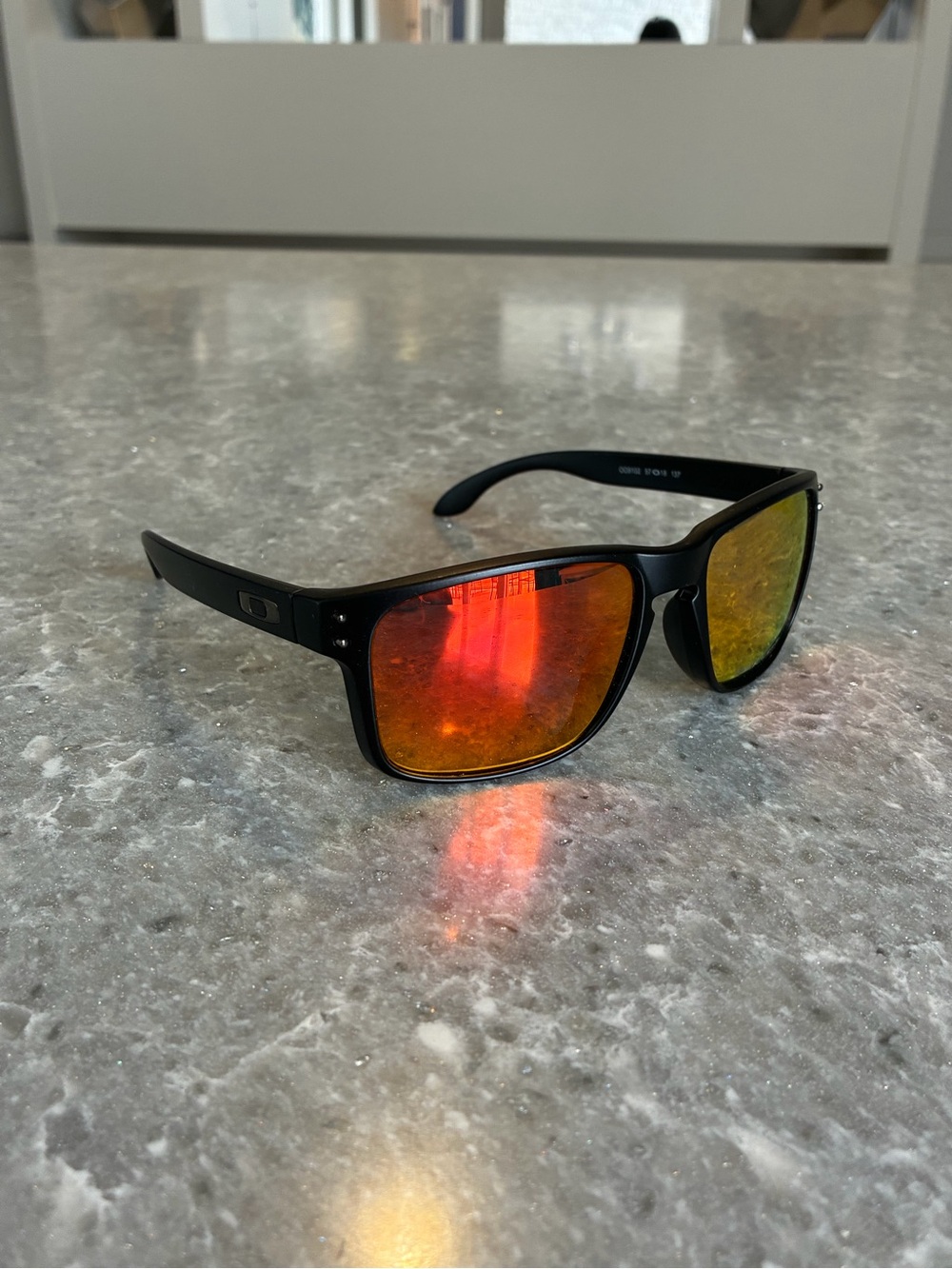 Oakley Holbrook Black Frame Sunglasses with Orange-Red Mirrored Lenses